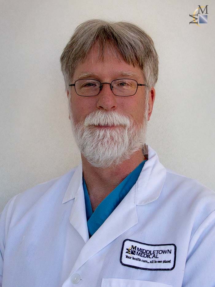 JOHN PODESZWA, M.D.